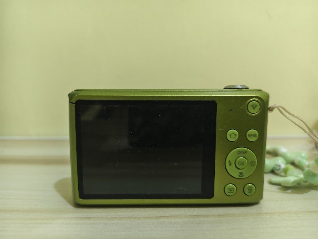 Samsung DV150F (GREEN) with 8gb Micro SD card (Category: Cameras) located in Masbate. Submitted by lightscam_action (Listing ID 1469395243, Image 3). Description: 🔖 P 2,999 (still negotiable) ✨ 16.2 effective megapixel 1/2.33-inch CCD sensor ✨ 5x optical zoom lens, 25–125mm equivalent focal length (F2.5 wide to F6.3 telephoto) ✨ Dual displays: • Rear: 2.7-inch TFT LCD (fixed) • Front: 1.5-inch front LCD for framing selfies ✨ working flash, red l