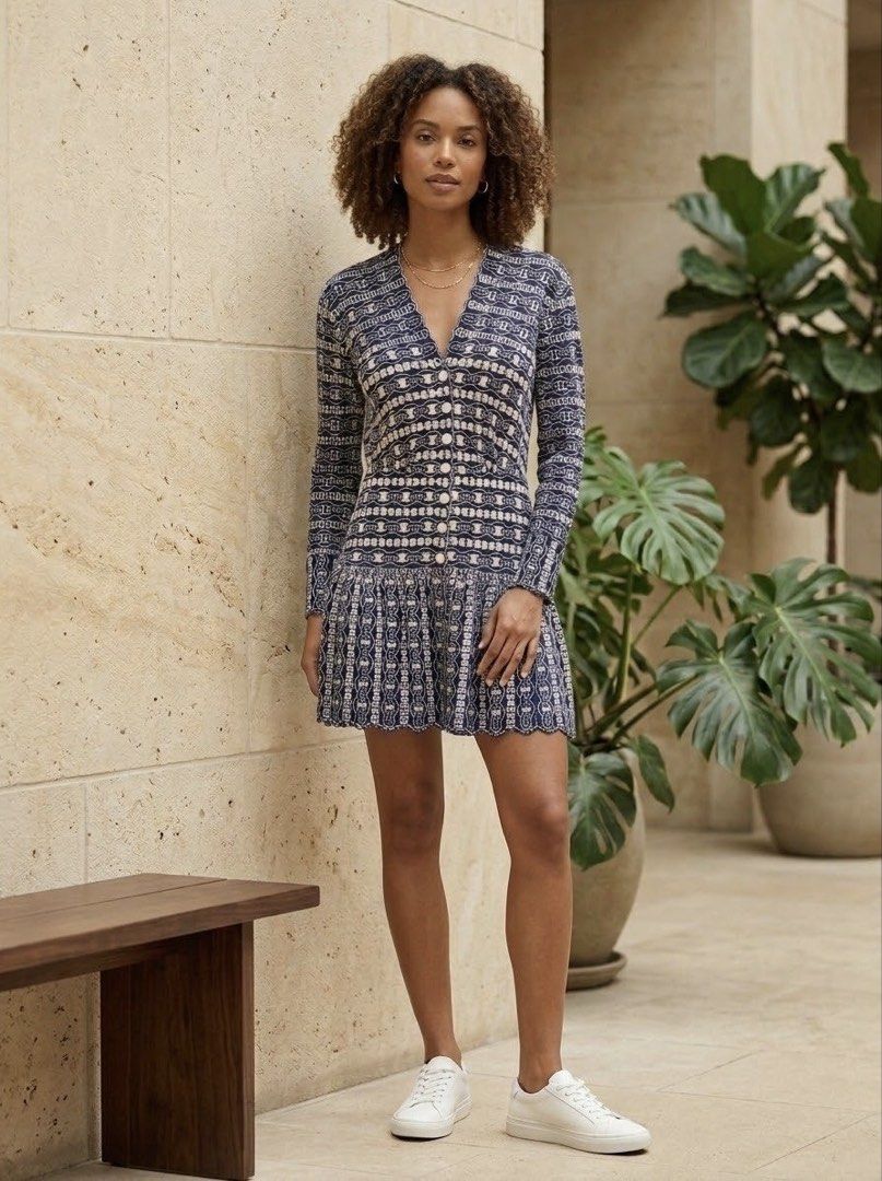 Sandro Navy Blue Chain Eyelet Snap Button Mini Dress (Category: Dresses) located in Cebu City. Submitted by stylingtrends.coll (Listing ID 1469434517, Image 1). Description: - Color: Navy blue and white eyelet embroidered chain pattern - Style: Mini dress with drop waist and flared skirt - Details: Long sleeves, snapbutton-front closure, and charming scalloped trim along the V-neck and hem - Casual dates, brunch, or smart-casual events Size: Smal