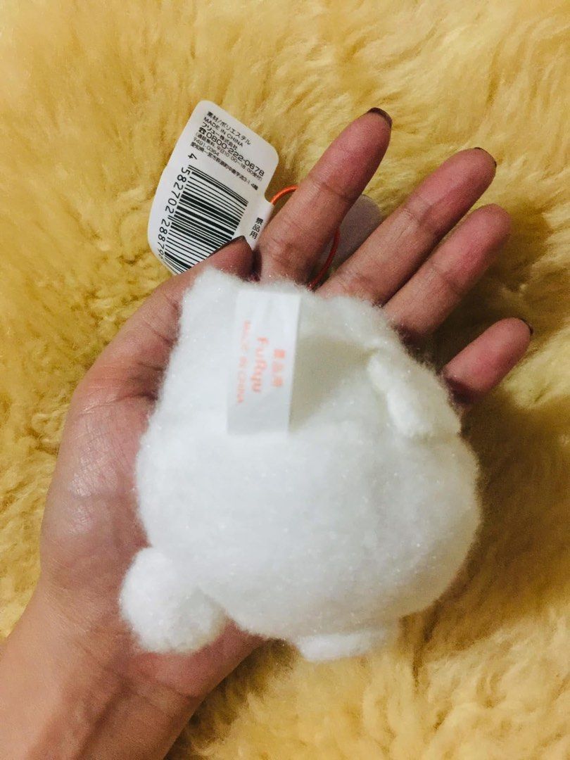 Sanrio Hanamaru Obake Mascot Plush Keychain (Category: Plushies & Soft Toys) located in Baguio. Submitted by izza_thrifty (Listing ID 1469513779, Image 3). Description: - Item: Sanrio Hanamaru Obake Plush Keychain - Condition: Brand new with original tags attached - Design: Embroidered facial details, cute pink cheeks, and orange swirl accent on the back - Details: Includes hanging loop with speech bubble tag - Authenticity: Official Furyu prize 