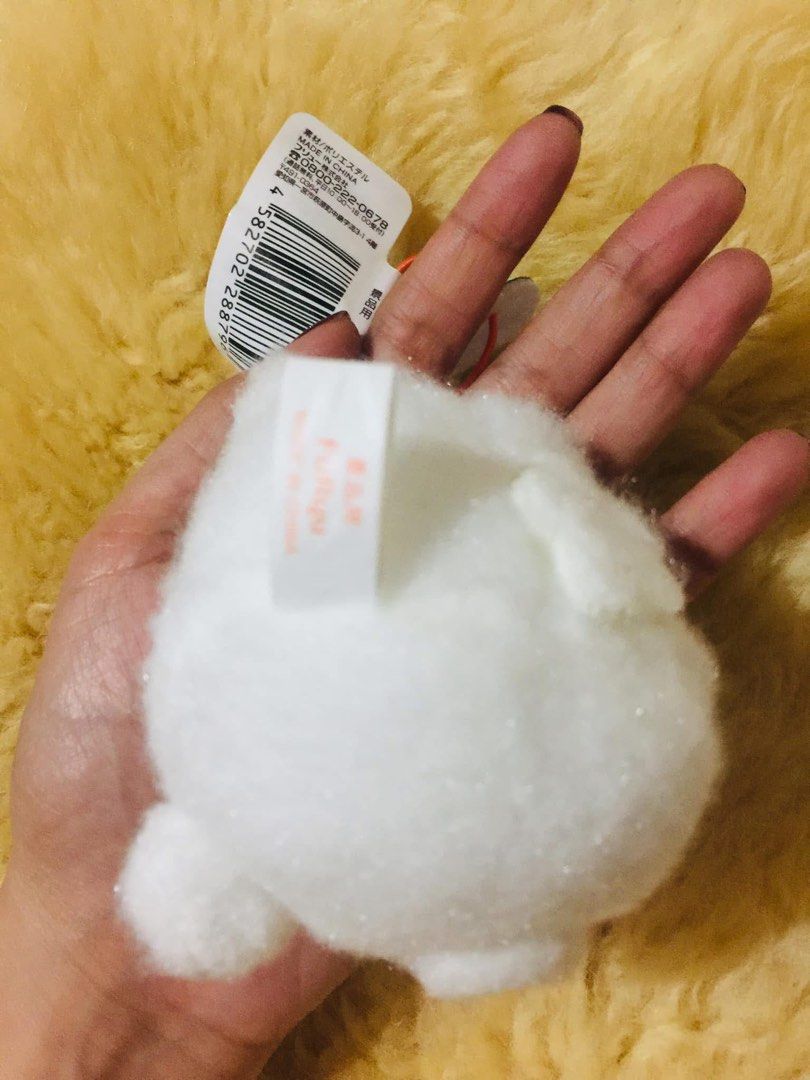 Sanrio Hanamaru Obake Mascot Plush Keychain (Category: Plushies & Soft Toys) located in Baguio. Submitted by izza_thrifty (Listing ID 1469513779, Image 2). Description: - Item: Sanrio Hanamaru Obake Plush Keychain - Condition: Brand new with original tags attached - Design: Embroidered facial details, cute pink cheeks, and orange swirl accent on the back - Details: Includes hanging loop with speech bubble tag - Authenticity: Official Furyu prize 