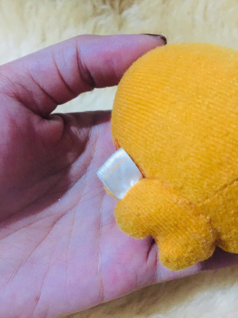 SAN-X Mikan Bouya (Category: Plushies & Soft Toys) located in Baguio. Submitted by izza_thrifty (Listing ID 1469514528, Image 3). Description: - Authentic San-X mascot plushie - Features a bright yellow-orange body, stitched facial details, and a green sprout on top - Made from ultra-soft fabric with official San-X side tag - Compact, pocket-sized design - Ideal for collectors and San-X fans.