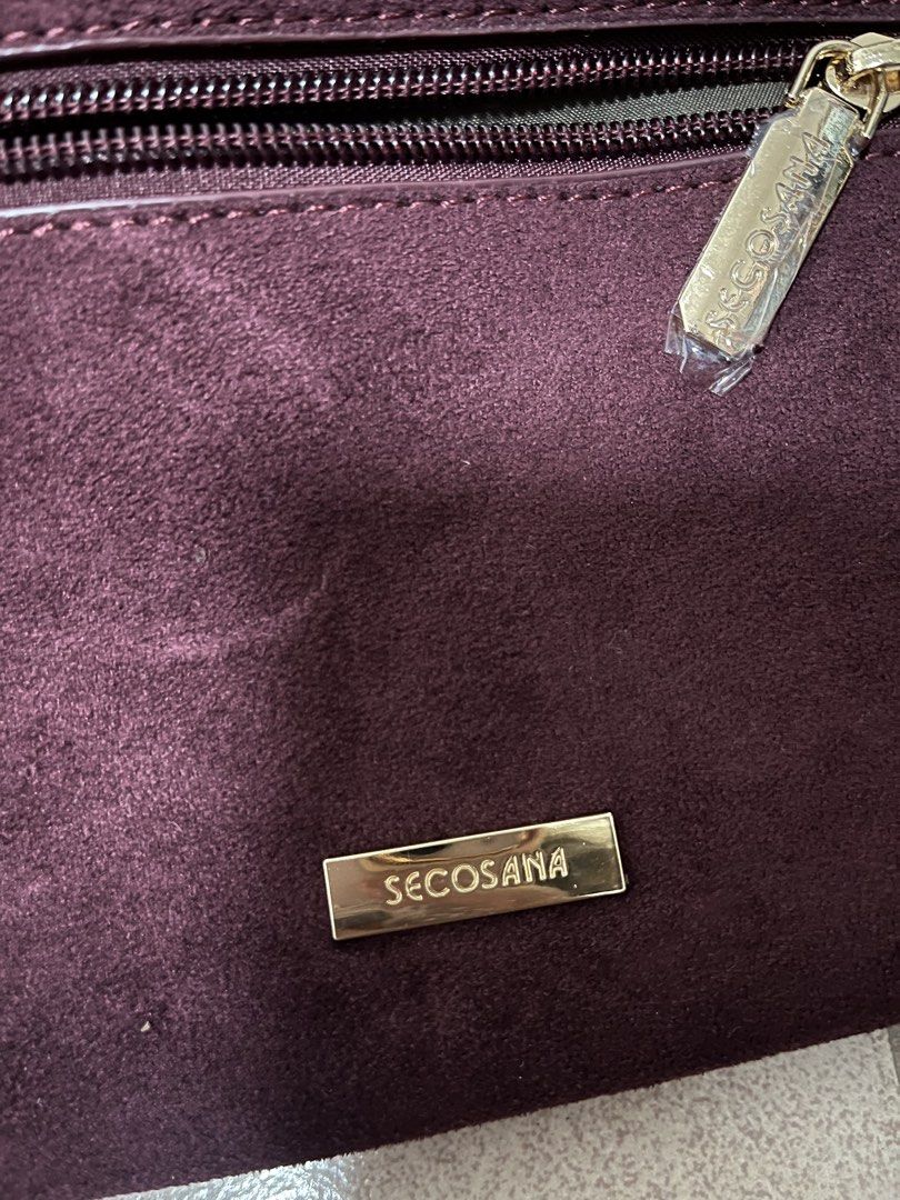 Secosana Alba Maroon Suede Hobo Medium Bag (Category: Shoulder Bags) located in Antipolo. Submitted by declutter.clothes (Listing ID 1469568060, Image 3). Description: - Brand: Secosana - Color: Deep Maroon - Material: Suede with gold-tone hardware - Closure: Front buckle strap - Condition: Like new, used for a few times only - Bought for 690 in orange app.