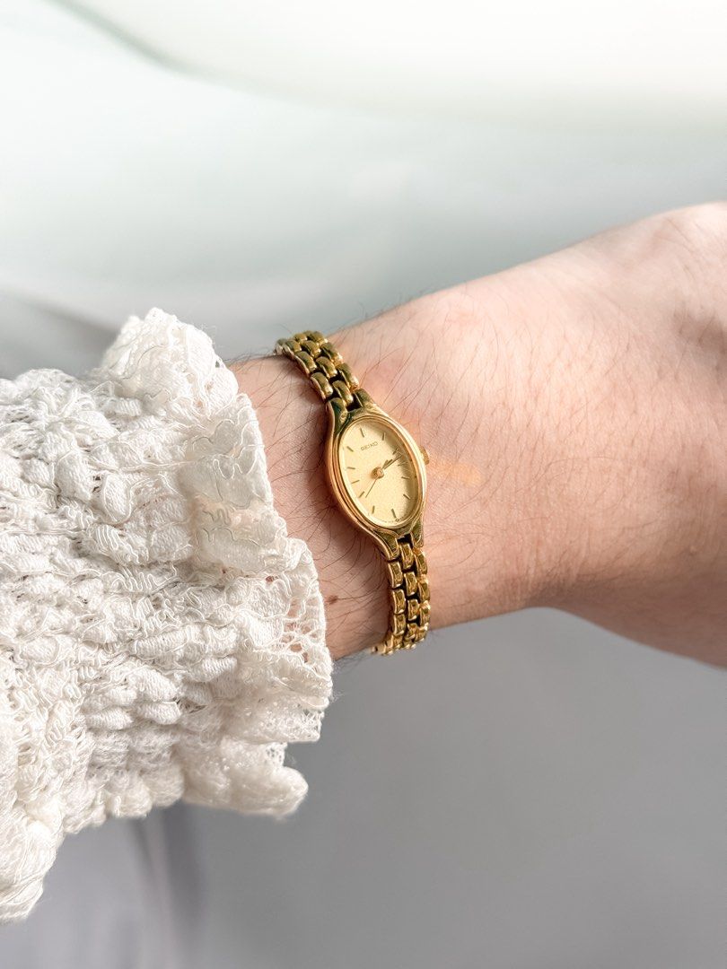 Seiko Mini Oval Watch in Gold (Category: Women's Watches) located in Santo Tomas. Submitted by elegante07 (Listing ID 1469482557, Image 2). Description: Gold Mini Oval Seiko Vintage Watch Details: * ONE OF THE MOST versatile vintage pieces * Good condition * Has some fadings of gold plating, including in the inside part of bracelet * One of the sought after seiko vintage models * Hairline scratches on glass part (not noticeable when worn and with