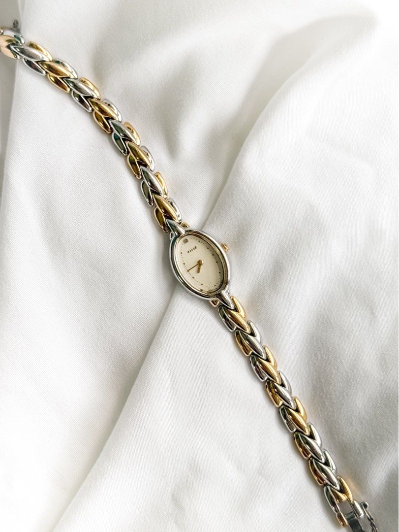 Seiko Tisse Oval with Diamond Indexes (Category: Women's Watches) located in Santo Tomas. Submitted by elegante07 (Listing ID 1469482338, Image 2). Description: (RARE) Seiko Tisse Oval with Diamond Indexes Details: * Excellent and in working condition ✨ * Model hard to come-by * 20 mm x 16.5 mm Case Diameter with crown * Adjustable Strap! Fits wrist (approx. 16.8 cm) * Quartz Movement Includes: 🤎 Newly replaced battery 🤎 Velvet Replacement Box 