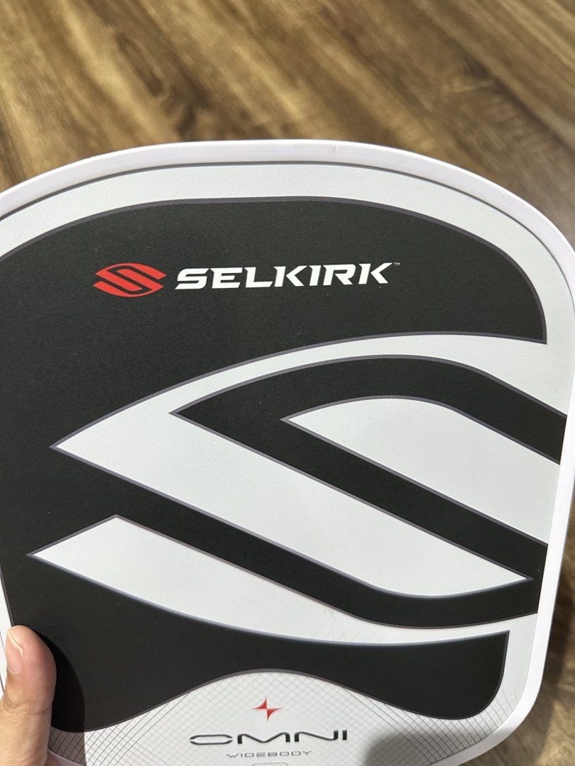 Selkirk Omni Widebody (Category: Racket and Ball Sports) located in Paranaque City. Submitted by fshionfinds (Listing ID 1469411490, Image 3). Description: - Selling Authentic Selkirk Omni Widebody in Chalk - NFC Scannable - 2 weeks old - Used thrice - Has minimal signs of wear - A few unnoticeable scratches and dents on edge - Does not affect the overall performance of the paddle - MOI weights has never been used -FIRM on price -bought for 18k R