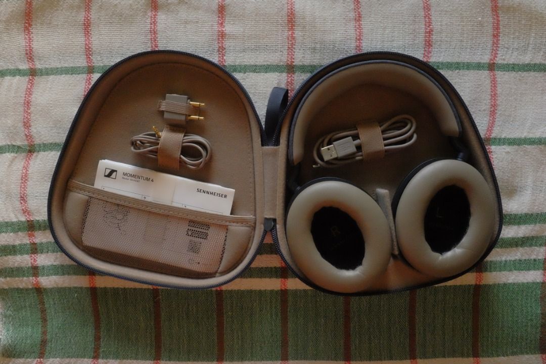 Sennheiser Momentum 4 Wireless Headphones (Category: Headphones & Headsets) located in Las Pinas. Submitted by a.flor (Listing ID 1469490736, Image 2). Description: Sennheiser Momentum 4 - denim - wireless bluetooth headphones - noise cancellation - 60hours battery life - microphone - touch interface - EQ (via app) complete with case, usb-c cable, aux cable, airplane adapter, manual, box, and original receipt good as new functionality 10/10 cosme