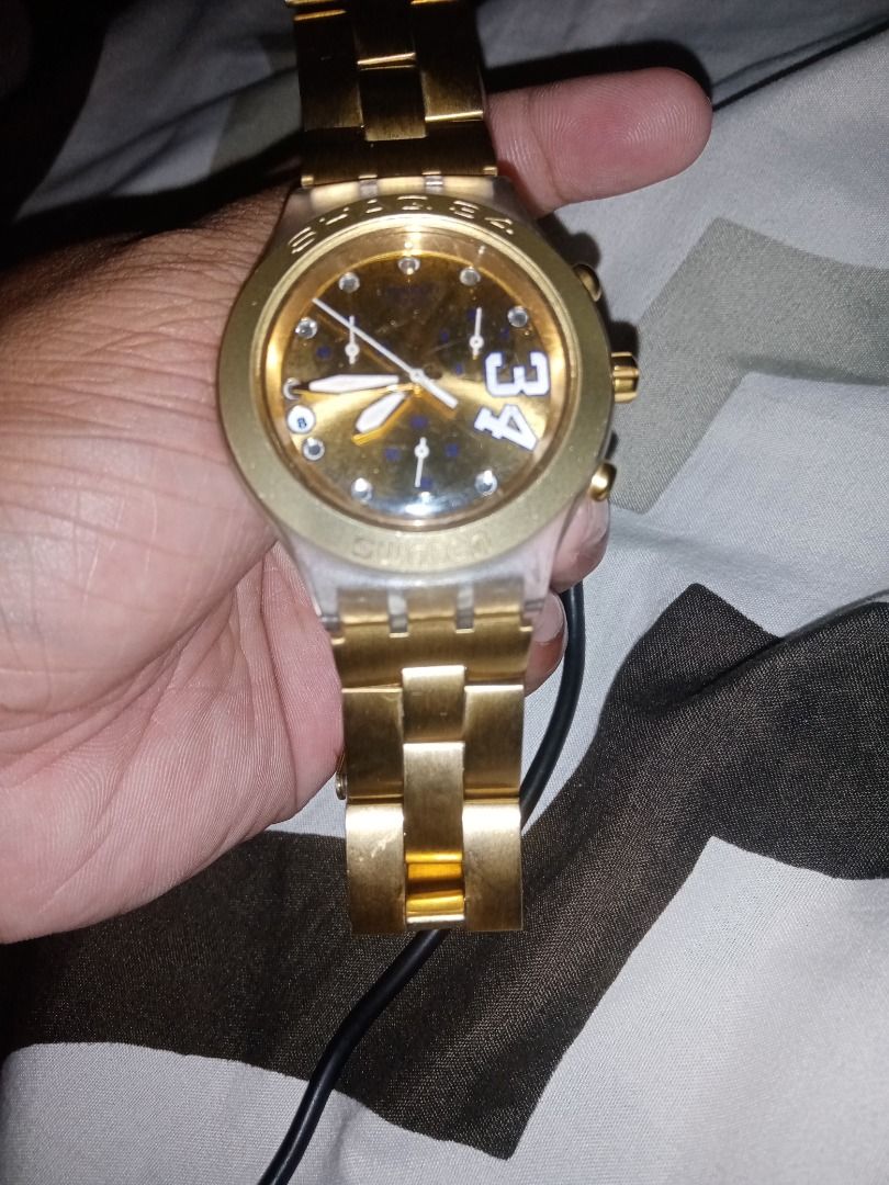 SHAQ 34 GOLD (Category: Luxury Watches) located in Caloocan City. Submitted by epichawk_ded244 (Listing ID 1469572590, Image 2). Description: Swatch SHAQ 34 GOLD.