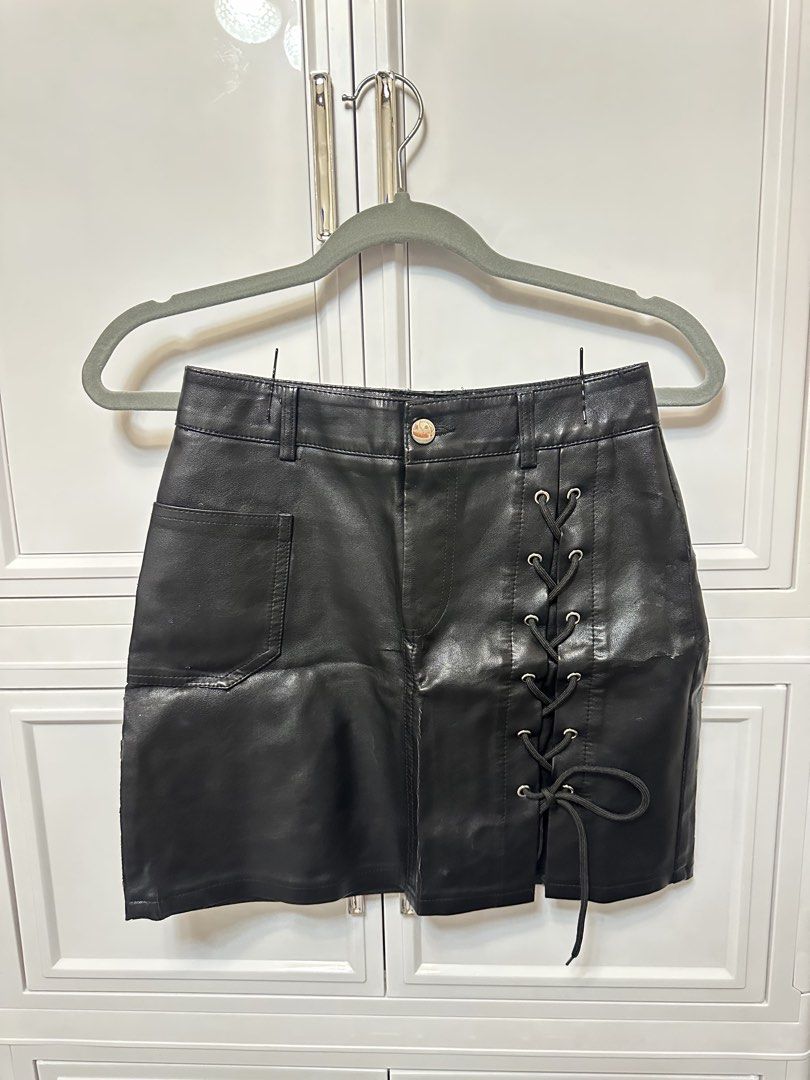 SHEIN Black Leather Skirts (Category: Skirts) located in Quezon City. Submitted by jeydeegmr (Listing ID 1469453122, Image 1). Description: Size small Waist 25-28 .