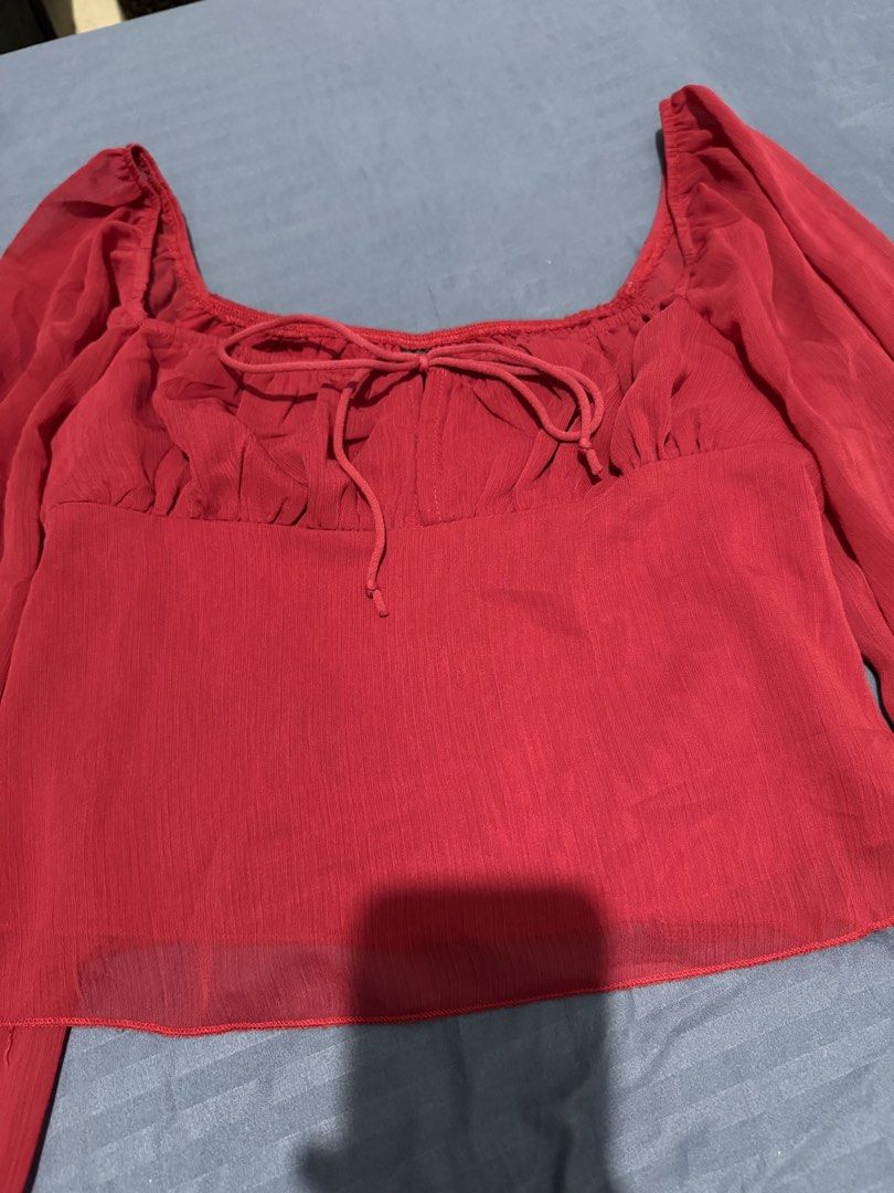 Shein Red Square Neck Coquette Top (Category: Longsleeves) located in Mandaluyong City. Submitted by blzstr (Listing ID 1469434771, Image 2). Description: Square neckline, cute front tie detail, flowy long sleeves, lightweight fabric.