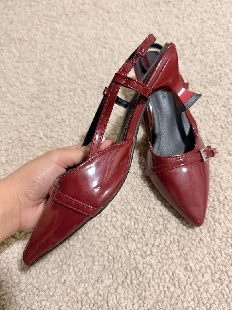 Shishang & Nixie Red Patent Slingback Heels (Category: Heels) located in Las Pinas. Submitted by ann.co. (Listing ID 1469543923, Image 2). Description: - Brand: Shishang & Nixie - Style: Red patent slingback heels with pointed toe - Details: Decorative front buckle and adjustable side strap - Heel: Comfortable low kitten heel - Interior: Black lining with branded insole - Condition: Brand new / Excellent (ready to ship!) .