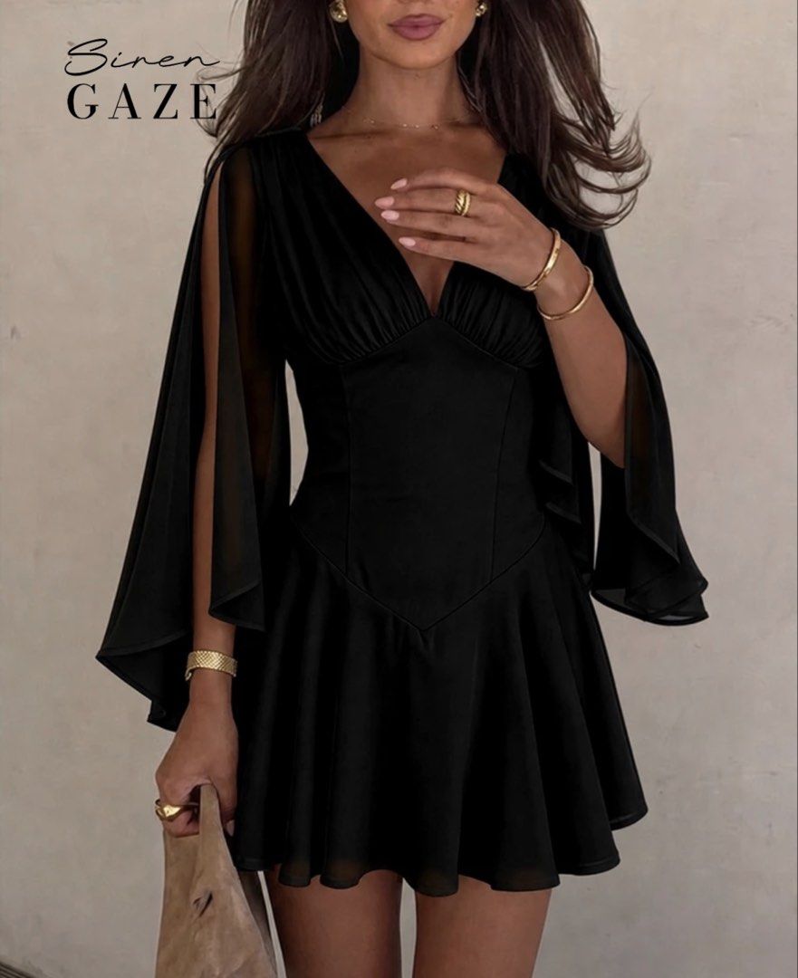 Short Black Dress with Flowy Sleeves (Category: Dresses) located in Pasig City. Submitted by shopsyre (Listing ID 1469501048, Image 3). Description: WORN ONCE ONLY, super flatteringg :) - Style: Siren Gaze black mini dress with deep V-neckline and gathered bodice - Sleeves: Sheer cape-style with stylish open slits down the arms - Fit: Fitted waist and flared pleated skirt, fits true to size - Material: Lightweight chiffon-like fabric.