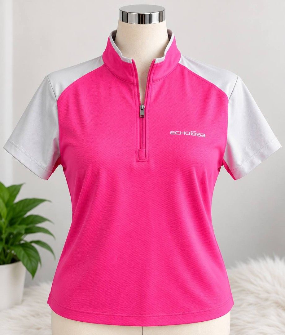 Short Sleeve Polo Shirts (Category: Activewear) located in Cagayan de Oro. Submitted by micaverzosa30 (Listing ID 1469550027, Image 1). Description: - Color: Hot pink with white shoulder accents - Style: Half-zip collar with short sleeves - Material: Lightweight performance fabric for outdoor sports or casual wear - Details: Clean logo branding on the chest - Condition: Excellent, ready to wear.