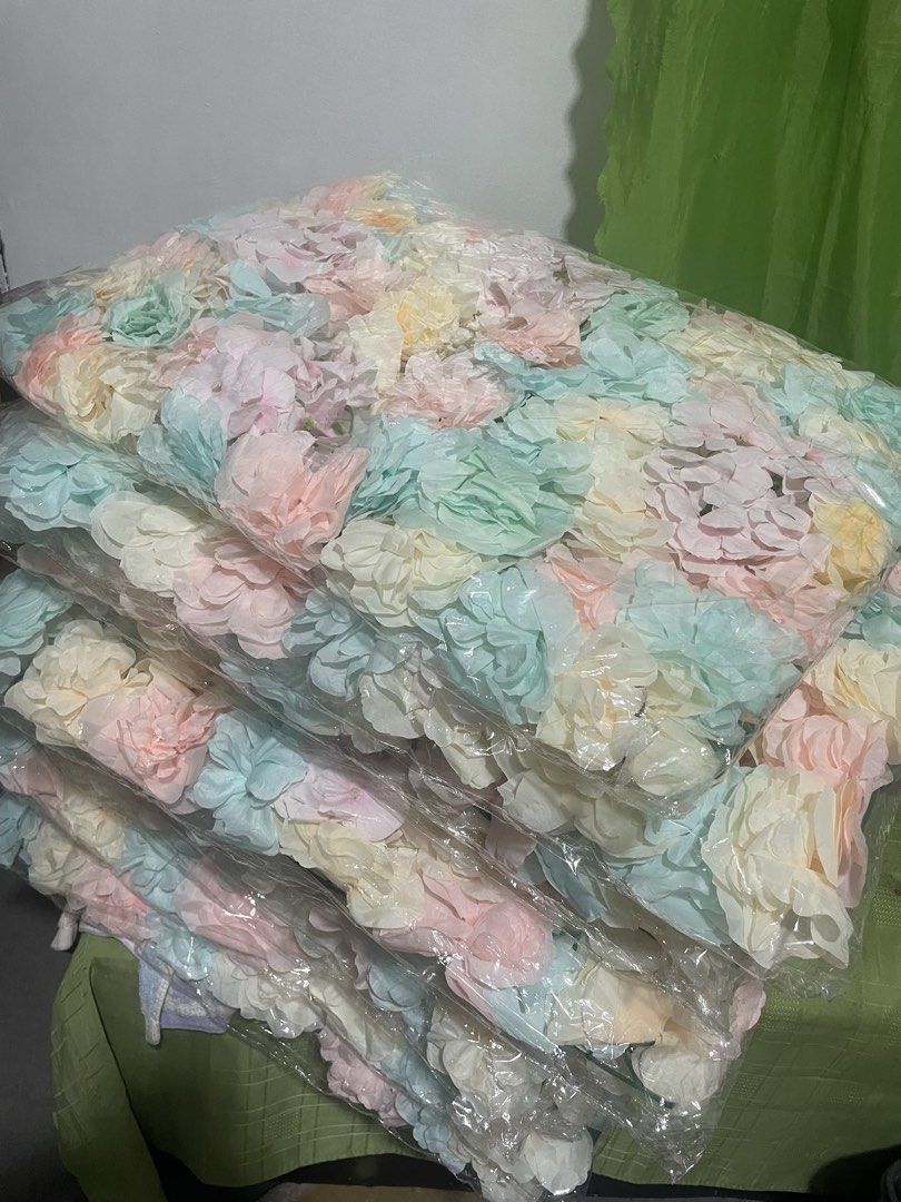 Silk Flower Wall Decoration Photo Prop Background (Category: Wall Decor) located in Imus. Submitted by rey15blue (Listing ID 1469559496, Image 3). Description: - Multi-colored artificial flower wall panels in dreamy pastel shades (blue, pink, yellow, cream) - Brand new and individually sealed in plastic packaging for protection - Ideal backdrop for weddings, birthdays, baby showers, and studio shoots - Easy to transport, multiple packs available 