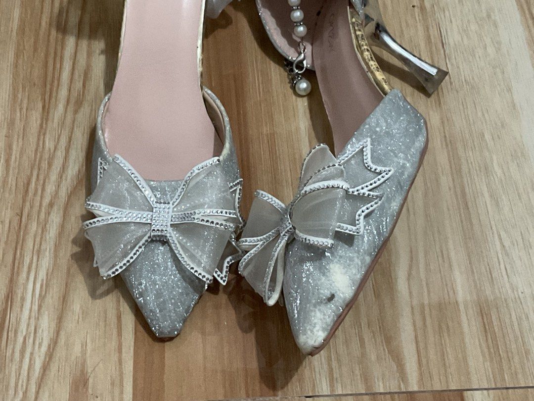 Silver Glitter Bow Heels | Size 40 (Category: Heels) located in Santa Rosa. Submitted by silvercloud_c774d5 (Listing ID 1469549827, Image 3). Description: Silver Glitter Bow Heels | Size 40 | ₱550 Selling these pretty silver glitter heels with pearl straps, rhinestone details, and cute organza bows! Perfect for parties, birthdays, graduation, or other special occasions. Price: ₱550 Size: 40 Condition: Used once only ⚠️ Flaws: Has some minor flaws