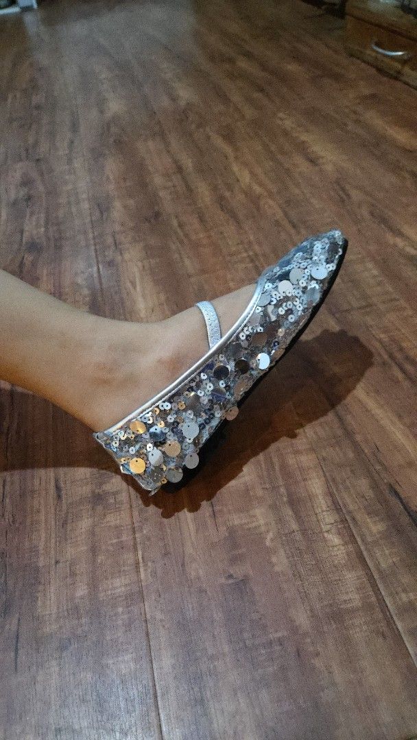Silver Sequin Ballet Flats with Elastic Strap (Category: Flats & Sandals) located in Manila. Submitted by mysticrabbit.284012 (Listing ID 1469567651, Image 2). Description: - Color/Material: Sparkly silver sequins covering the upper - Fit: Elastic strap across the top for extra security - Interior: Comfortable black inner sole - Versatility: Fun statement shoes great for parties, dance, or casual everyday wear.