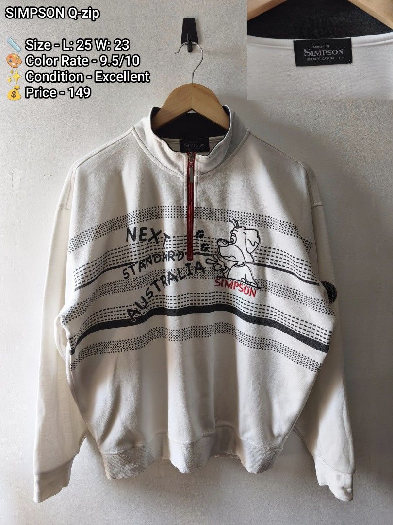 SIMPSON Q-zip Sweatshirt White Next Standard Australia (Category: Coats, Jackets and Outerwear) located in Manila. Submitted by gelog2 (Listing ID 1469418241, Image 1). Description: - Brand: Simpson Sports Casual (Licensed) - Color: White with red quarter-zip collar - Design: 'Next Standard Australia' text and cartoon dog graphic on front - Details: Ribbed cuffs and hem - Size: Tagged L (Dimensions: 25" length x 23" width) - Condition: Good pre-l