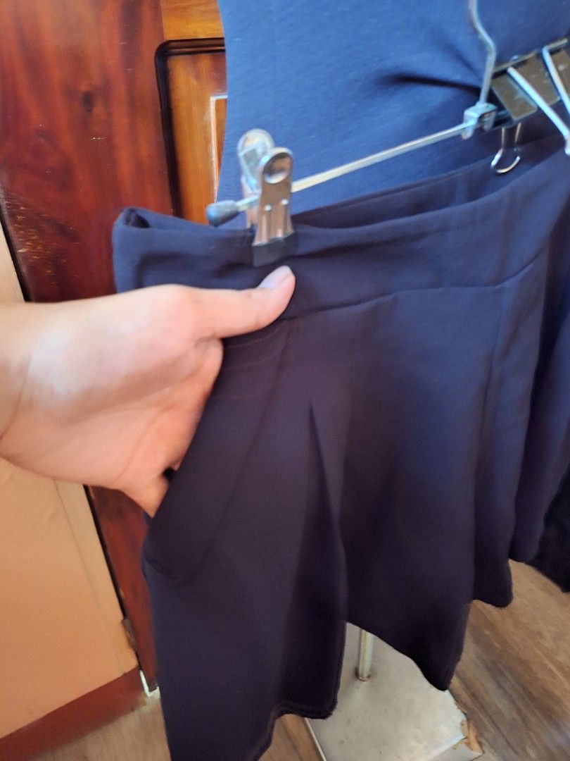 SKIRT SHORTS black pleated structured design mini length (Category: Skirts) located in Balamban. Submitted by ubethan (Listing ID 1469460799, Image 2). Description: Waist: 30.5 in" Length: 15 in" - Color: Black - Style: High-waist with structured pleats front and back - Size: Measures roughly 14 to 15 inches across the waist (laid flat) - Condition: Clean fabric, no stains, no loose threads - Versatility: Perfect for both office wear and casual o