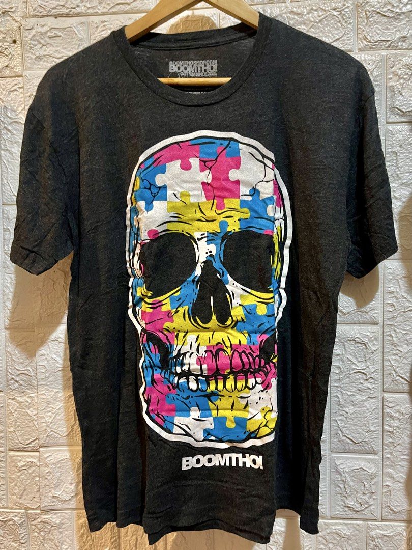 Skull Graphic Tshirt (Category: Tshirts & Polo Shirts ) located in Manila. Submitted by brex_3108 (Listing ID 1469443051, Image 1). Description: 🔥 Bold, colorful skull design — perfect for streetwear and casual outfits! ✔️ Brand: BOOMTHO! ✔️ Size: Large (L) ✔️ Color: Dark Gray / Charcoal ✔️ Material: 100% Cotton ✔️ Made in Mexico 🇲🇽 ✔️ Eye-catching multicolor graphic print 📏 Actual Measurements: • Width (pit-to-pit): 20 inches • Length: 27 in
