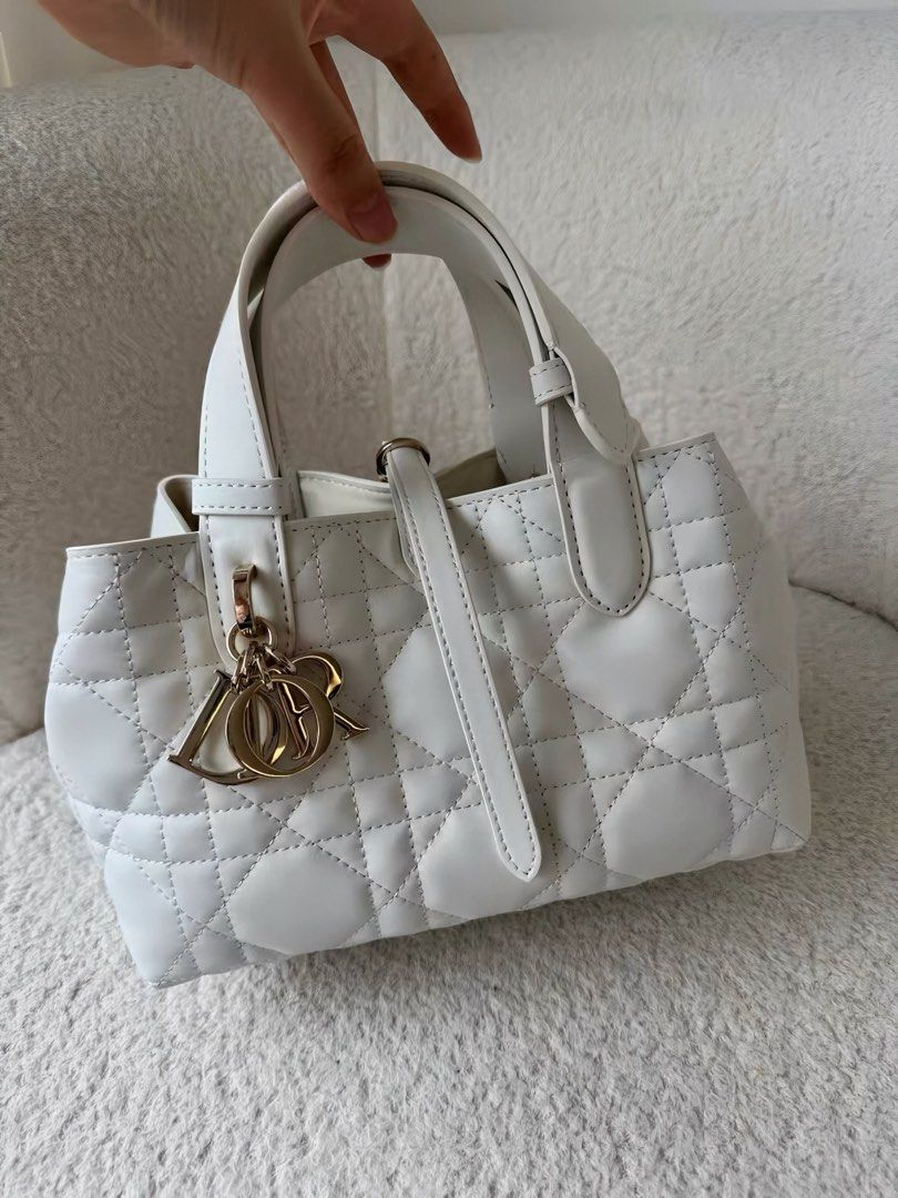 Small Dior Toujours Bag White (Category: Luxury Bags & Wallets) located in Las Pinas. Submitted by moonlaight (Listing ID 1469530935, Image 2). Description: Small Dior Toujours Bag in White/Latte Macrocannage Calfskin (gold hardware) Condition: Almost brand new please refer to the photos for the bag’s condition 🫶🏻 Inclusions: Box and dust bag.