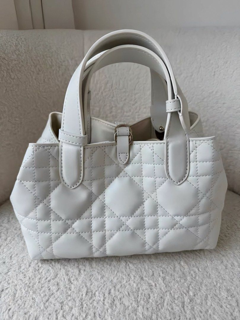 Small Dior Toujours Bag White (Category: Luxury Bags & Wallets) located in Las Pinas. Submitted by moonlaight (Listing ID 1469530935, Image 3). Description: Small Dior Toujours Bag in White/Latte Macrocannage Calfskin (gold hardware) Condition: Almost brand new please refer to the photos for the bag’s condition 🫶🏻 Inclusions: Box and dust bag.