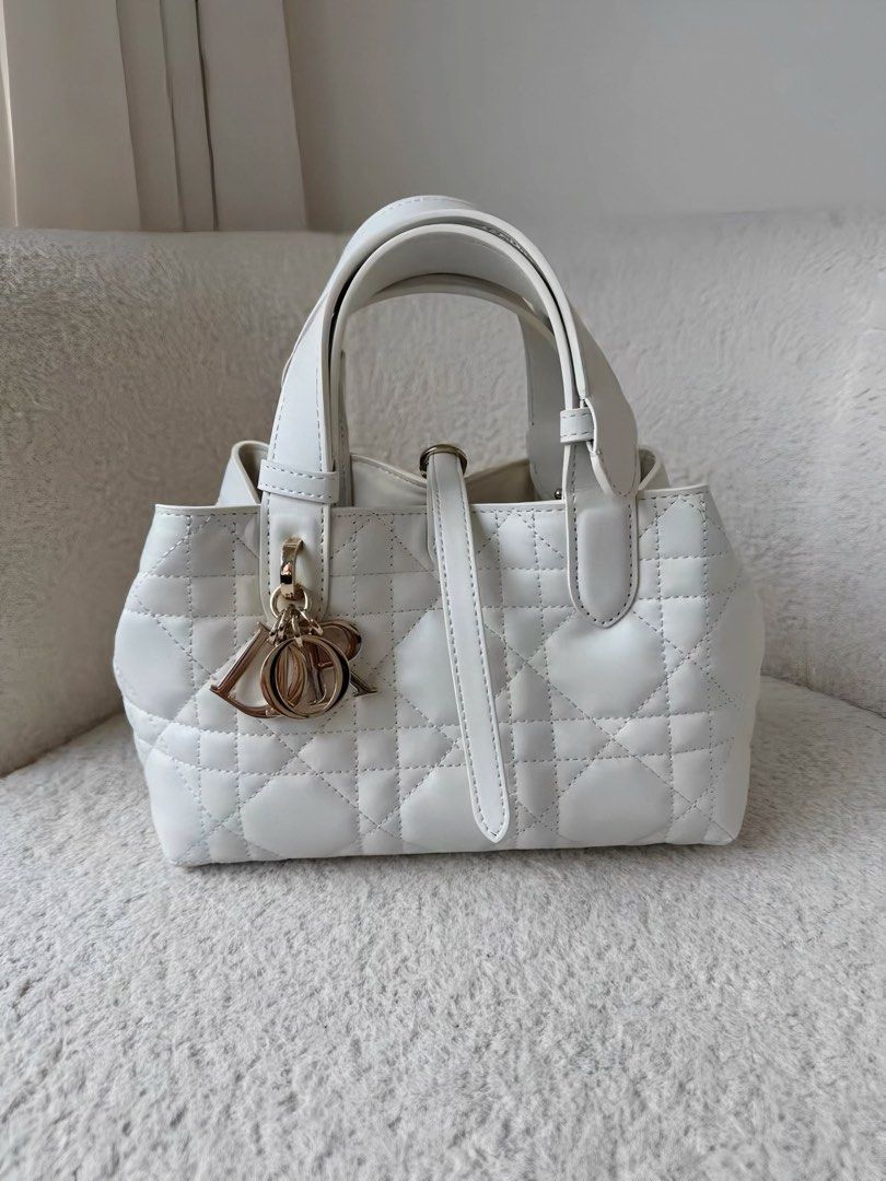Small Dior Toujours Bag White (Category: Luxury Bags & Wallets) located in Las Pinas. Submitted by moonlaight (Listing ID 1469530935, Image 1). Description: Small Dior Toujours Bag in White/Latte Macrocannage Calfskin (gold hardware) Condition: Almost brand new please refer to the photos for the bag’s condition 🫶🏻 Inclusions: Box and dust bag.