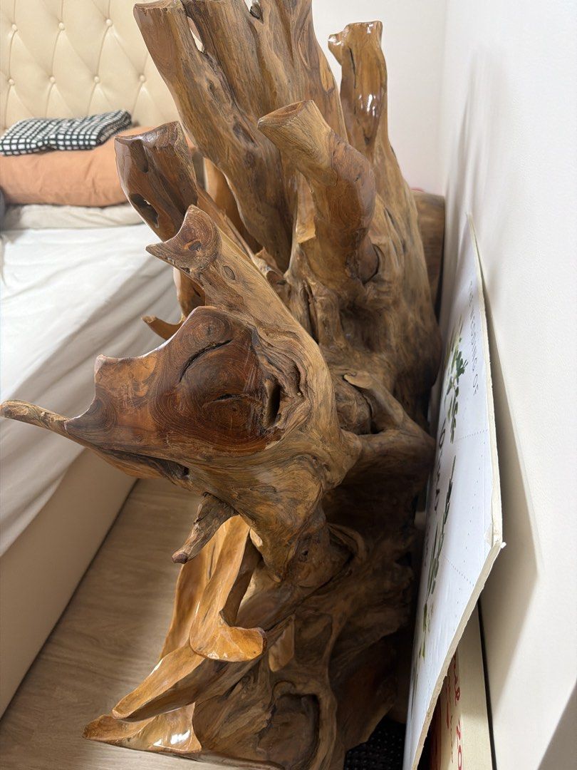 Solid Teak Root Table Base (Category: Other Home Furniture) located in Singapore. Submitted by rinokatak101042 (Listing ID 1469439005, Image 3). Description: - Material: Solid natural wood with a polished finish - Design: Organic piece featuring intricate branches, knots, and rich brown wood grain tones - Use: Ideal standalone accent piece for your home or office - Beautiful: Solid teak root table base. Strong and unique natural wood design. - No