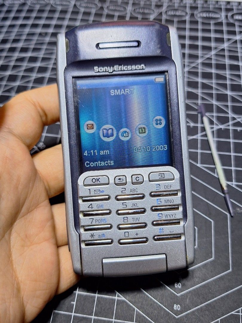 Sony Ericson P900 (Category: Early Generation Mobile Phones) located in Manila. Submitted by chingantigo (Listing ID 1469552329, Image 2). Description: OLD SCHOOL SONY ERICSON P900 ACTUAL PHOTO POSTED, CHECK ONE BY ONE TO ALL PHOTO. NO ISSUE AT ALL BUKOD SA MGA MINIMAL SCRATCHES AND WALA LANG TAKIP YUNG MEMORY BECAUSE SIGN OF AGING.. BUT DOES NOT AFFECT THE PERFORMANCE OF UNIT, WITH STYLUS PEN AND MEMORY CARD PA SYA, STILL PRESENTABLE PA RIN KUNG