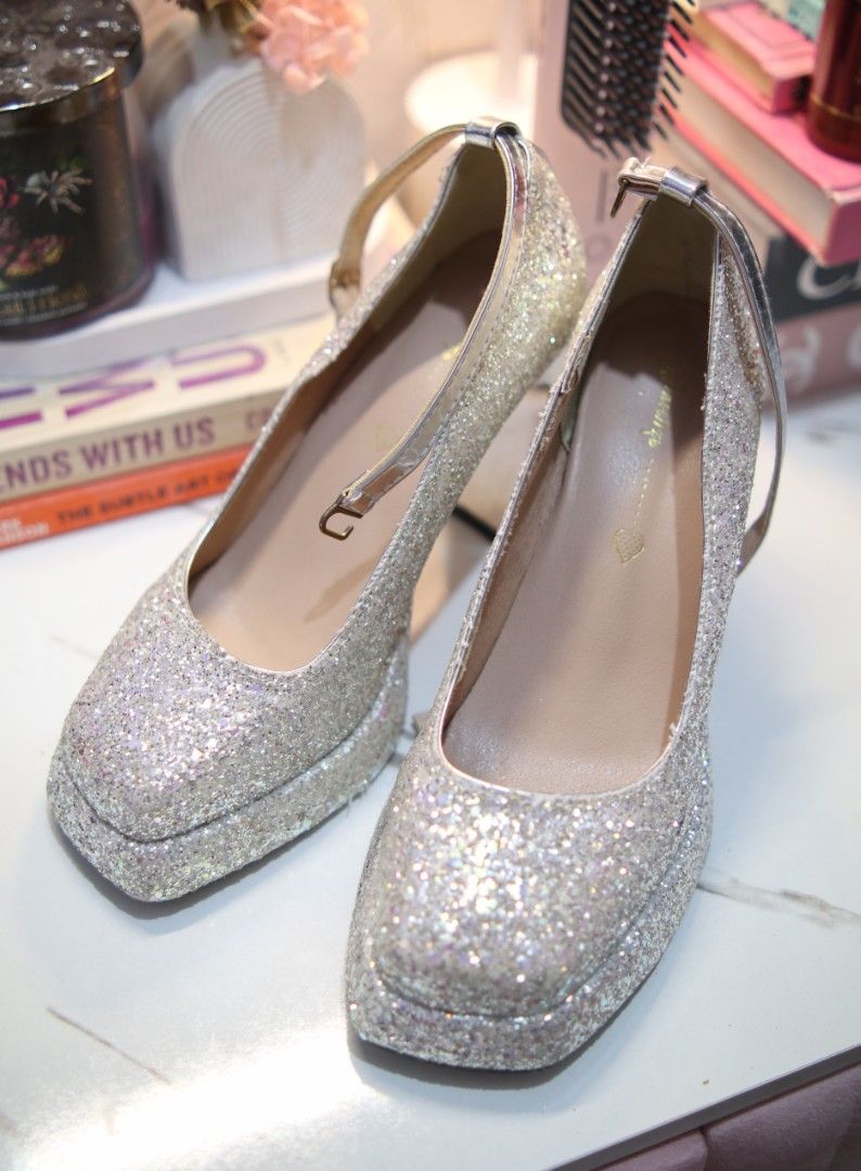 SPARKLY GLITTER HEELS (Category: Heels) located in Marikina City. Submitted by iamnicolefaller (Listing ID 1469431971, Image 1). Description: Sparkly Glitter Silver Heels Good for parties Size 7 Selling for ONLY PHP349!!!! Bought for 580+ *with minimal flaw (see last pic) (can be repaired by mighty bond) 📍Marikina City mop: gcash, bpi shipping via jnt, lala, grab .