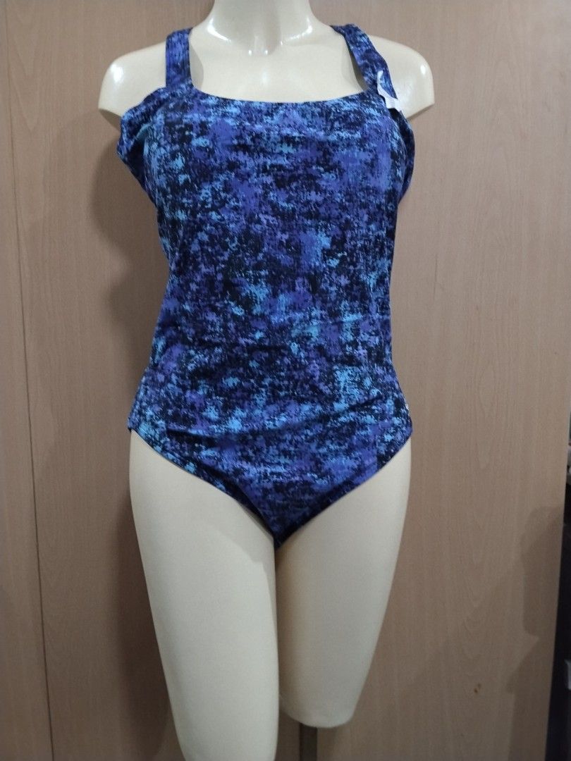 Speedo Blue Patterned One-Piece Swimsuit Size 18 (Category: Bikinis & Swimsuits) located in Manila. Submitted by ajrswimwear (Listing ID 1469556124, Image 1). Description: - Brand: Speedo - Style: One-piece swimsuit with chic criss-cross strap back - Pattern: Blue and black abstract - Size: 18 (tag attached inside) - Material: 80% nylon, 20% spandex (shell); 100% polyester (lining) - Condition: Brand new with tags.