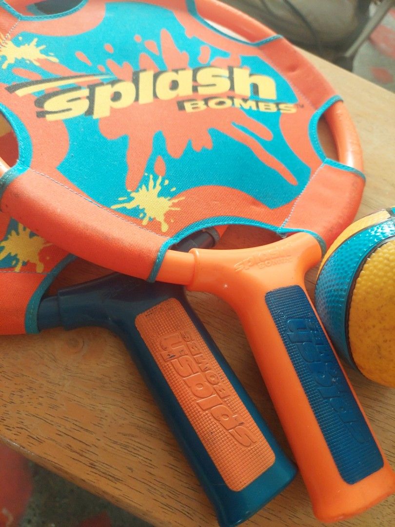 Splash Bombs, Water Paddle Set (Category: Action & Battle Toys) located in Quezon City. Submitted by donjie (Listing ID 1469413027, Image 2). Description: Splash Bombs For Pool or Beach use 2 Paddles 1 Ball issue: Original Splash Bombs Ball, not available.