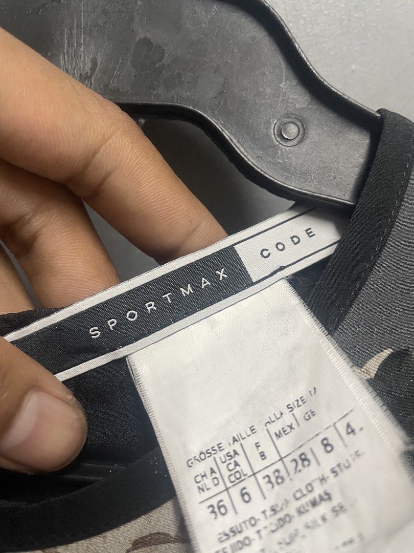 SPORTMAX (Category: Dresses) located in Dasmarinas. Submitted by jessputrages (Listing ID 1469479632, Image 3). Description: For sale Sportmax Excellent condition No issue 800 plus shipping fee Pm for more details.