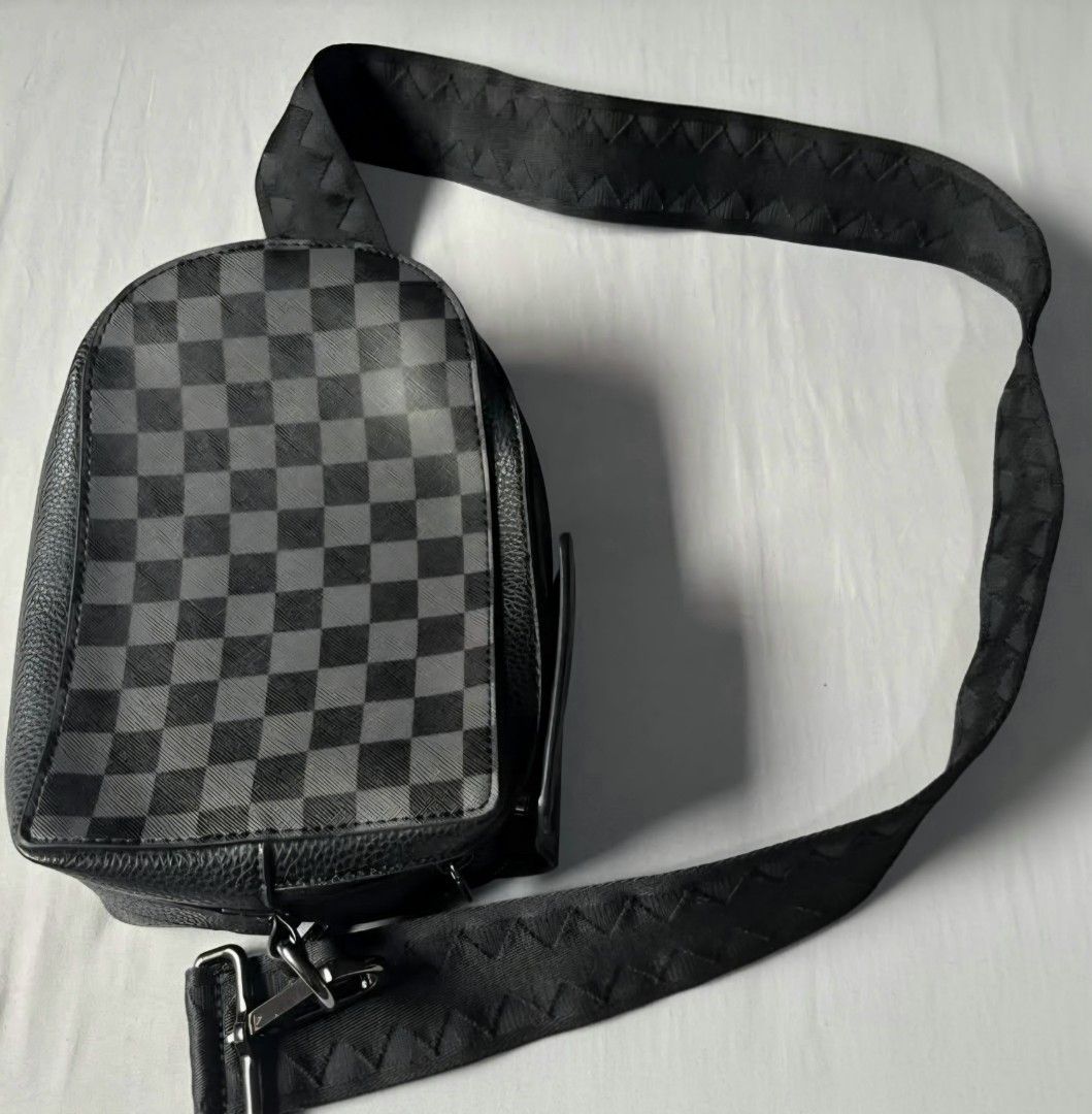 Sprayground Raceway Shadow Phantom Crossbody Sling Bag (Category: Sling Bags) located in Quezon City. Submitted by thriftstershop (Listing ID 1469427675, Image 2). Description: Brand: Sprayground Condition: Pristine Meet up: Trinoma or LRT 2 Anonas Shipping/Delivery: Lalamove LBC - Weekdays J&T - Weekends.