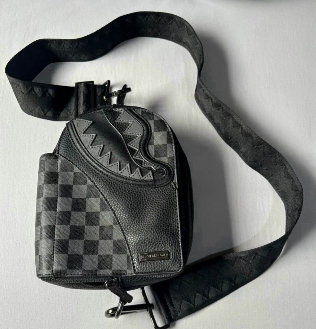 Sprayground Raceway Shadow Phantom Crossbody Sling Bag (Category: Sling Bags) located in Quezon City. Submitted by thriftstershop (Listing ID 1469427675, Image 1). Description: Brand: Sprayground Condition: Pristine Meet up: Trinoma or LRT 2 Anonas Shipping/Delivery: Lalamove LBC - Weekdays J&T - Weekends.