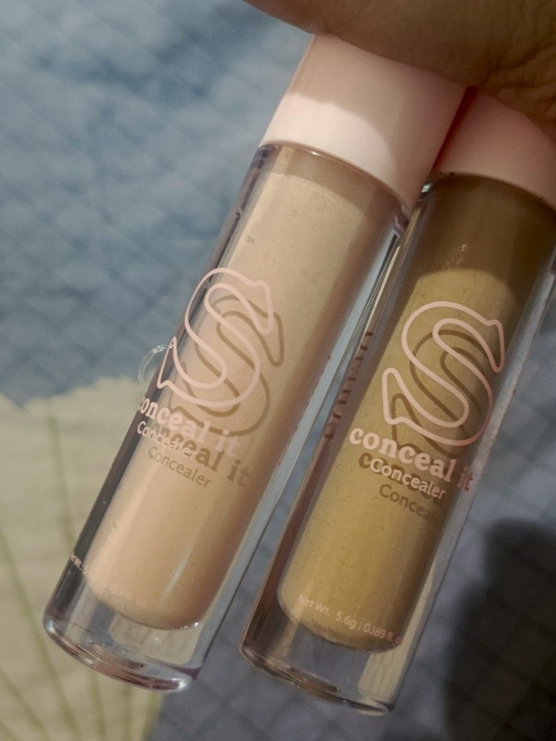 Squad Cosmetics Conceal It Concealer & Peach Corrector Set (Category: Makeup) located in Malasiqui. Submitted by shop.bea (Listing ID 1469395358, Image 2). Description: - Brand: Squad Cosmetics - Product: Conceal It Bundle (2-piece set) - Shades included: CM2 (Cool Medium Concealer) and CC2 (Peach Corrector) - Net Weight: 5.6g per tube - Benefits: Creamy formula, blends smoothly, perfect for covering dark circles and blemishes - Selling as a bund