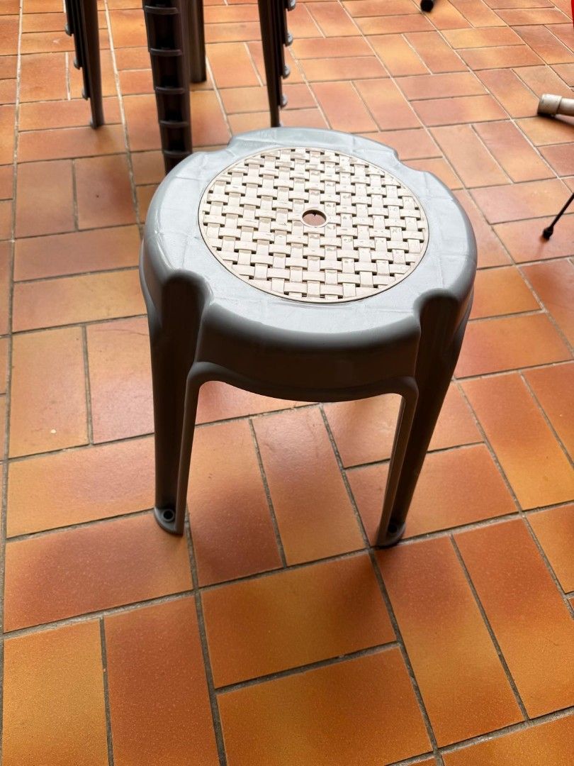 Stackable Grey Plastic Stools Set (Category: Chairs) located in Singapore. Submitted by kntnn (Listing ID 1469396873, Image 1). Description: Bundle of stackable grey plastic stools with textured anti-slip tops and sturdy legs. Perfect for extra seating indoors, on the balcony, or at outdoor gatherings.8 for 40 dollars. .