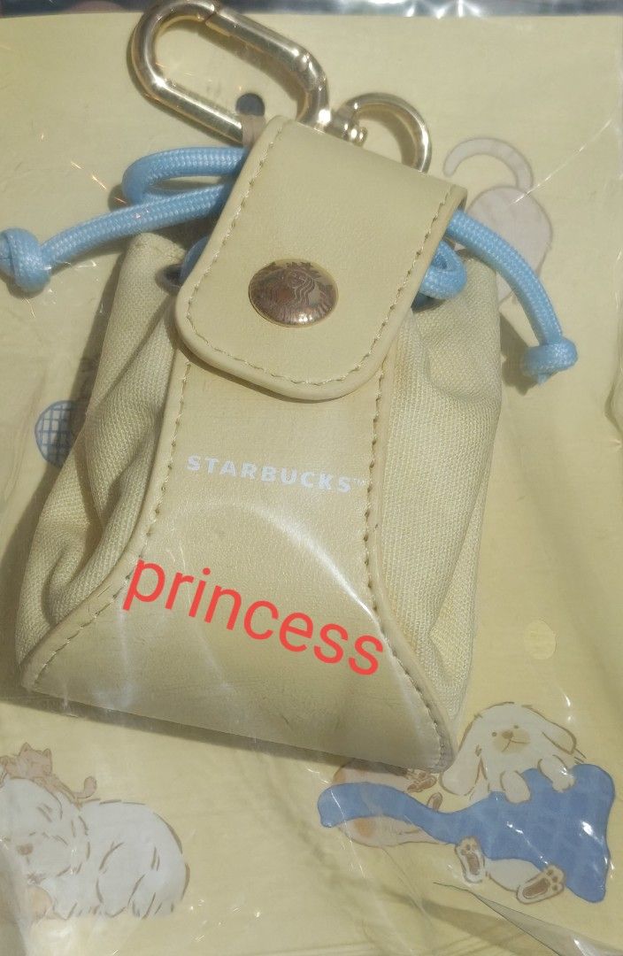 Starbucks PH Yellow Mini Pouch Keychain Bag (Sealed) (Category: Purses & Pouches) located in Manila. Submitted by princess271 (Listing ID 1469570892, Image 1). Description: Starbucks PH Yellow Mini Pouch Keychain Bag (Sealed).