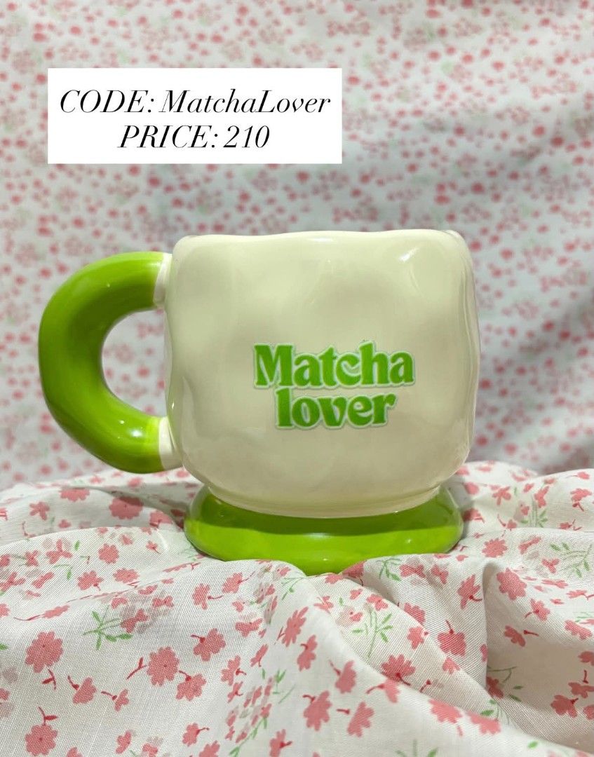 Statement mugs (Category: Coffee & Tea Tableware) located in Manila. Submitted by marjdv29 (Listing ID 1469421993, Image 1). Description: - Green and white ceramic mug - Features 'Matcha lover' text on the front - Quirky wavy design with a chunky handle and base - Standard size for coffee, tea, or your favorite matcha - Perfect addition to your cute mug collection.