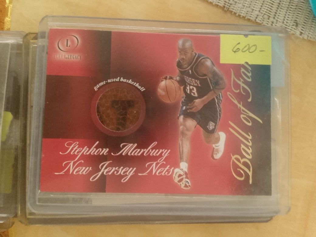 Stephon Marbury (Category: Raw Singles) located in San Juan City. Submitted by jim.jim7 (Listing ID 1469412871, Image 1). Description: - Stephon Marbury Fleer Legacy Ball of Fame insert card - Features a genuine game-used basketball piece embedded in the card - Wears the iconic New Jersey Nets uniform - Kept securely in a clear protective top loader - Ideal for basketball card collectors and New Jersey Nets fans.