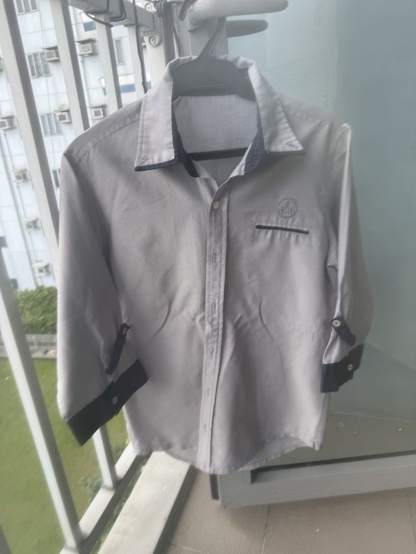 STI BS IT uniform Medium (all 3pcs) (Category: Tshirts & Polo Shirts ) located in Famy. Submitted by echolima21 (Listing ID 1469432381, Image 1). Description: - Brand/Designer: STI Exclusives by Frederick Peralta - Color: Gray with contrasting dark blue collar, pocket trim, and cuffs - Size: Medium - Features: Button-up front, roll-up sleeves with button tabs - Condition: Pre-loved with flaws (a couple of small holes near the bottom hem and a sma