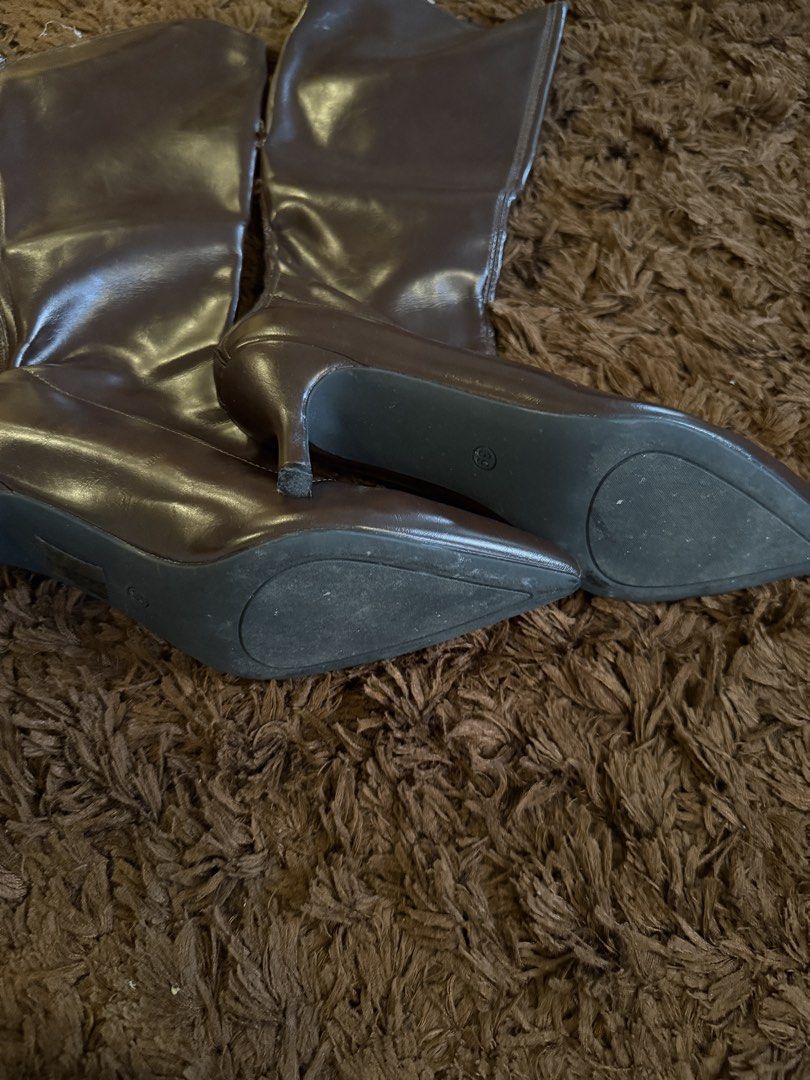 Stiletto Knee High Brown Boots (Category: Boots) located in Quezon City. Submitted by wear.again.ph (Listing ID 1469514733, Image 2). Description: 🩵 Negotiable 🩵 Condition: 8/10 🩵 Used twice only 🩵 Size: 39 but can fit 37.5-38 .