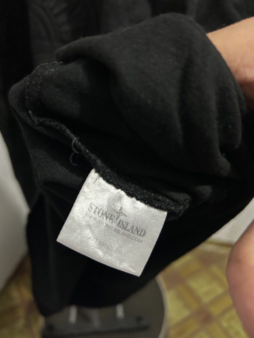 Stone Island Embossed Logo Tee Black (Category: Tshirts & Polo Shirts ) located in Manila. Submitted by garmentfinds.01 (Listing ID 1469525114, Image 3). Description: - Authentic Supreme x Stone Island Collaboration - Size: medium - Color: Black - Large embossed compass logo on chest - Removable Stone Island compass sleeve badge with buttons - Premium heavy cotton material - Verified inside authenticity tags attached.