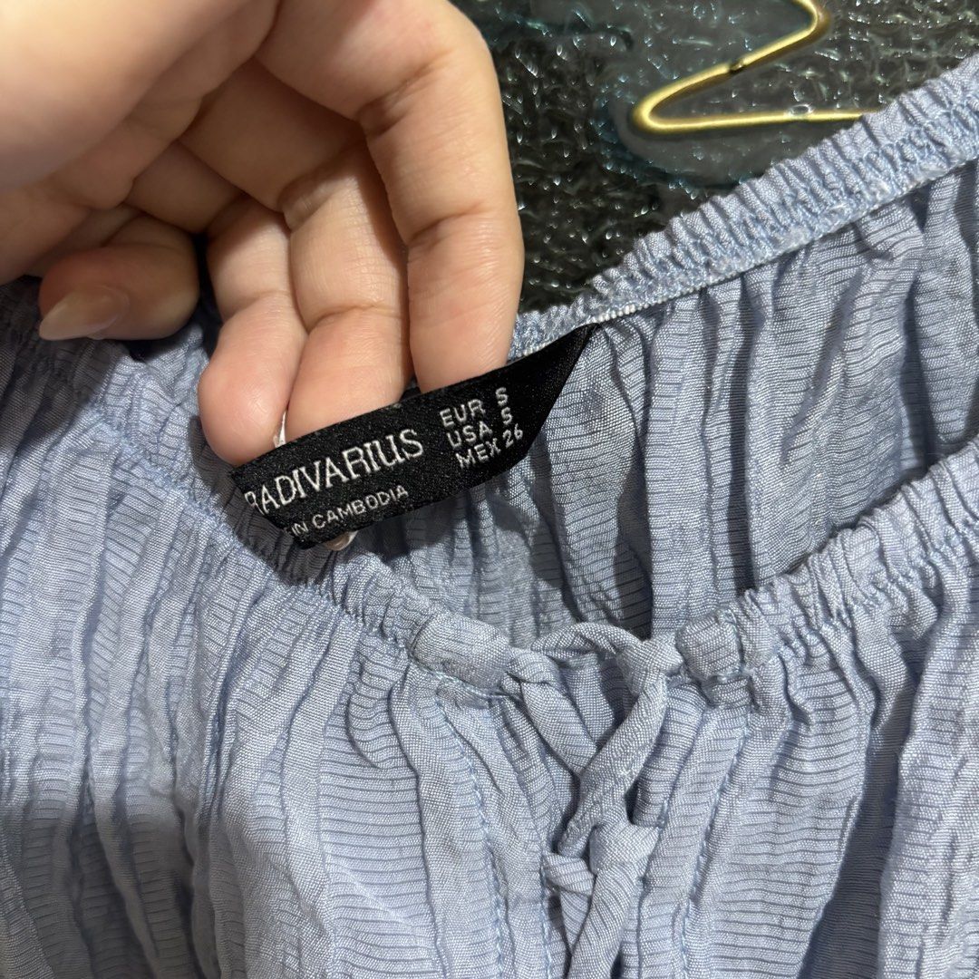 Stradivarius Puff Sleeve Top (Category: Blouses) located in Caloocan City. Submitted by declutter.cal (Listing ID 1469544096, Image 2). Description: Powder blue color Best fit s-semi m.