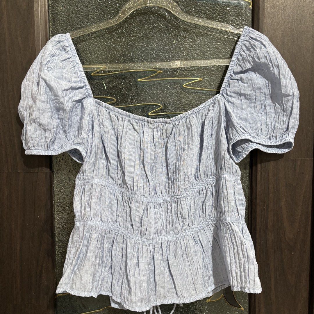 Stradivarius Puff Sleeve Top (Category: Blouses) located in Caloocan City. Submitted by declutter.cal (Listing ID 1469544096, Image 3). Description: Powder blue color Best fit s-semi m.