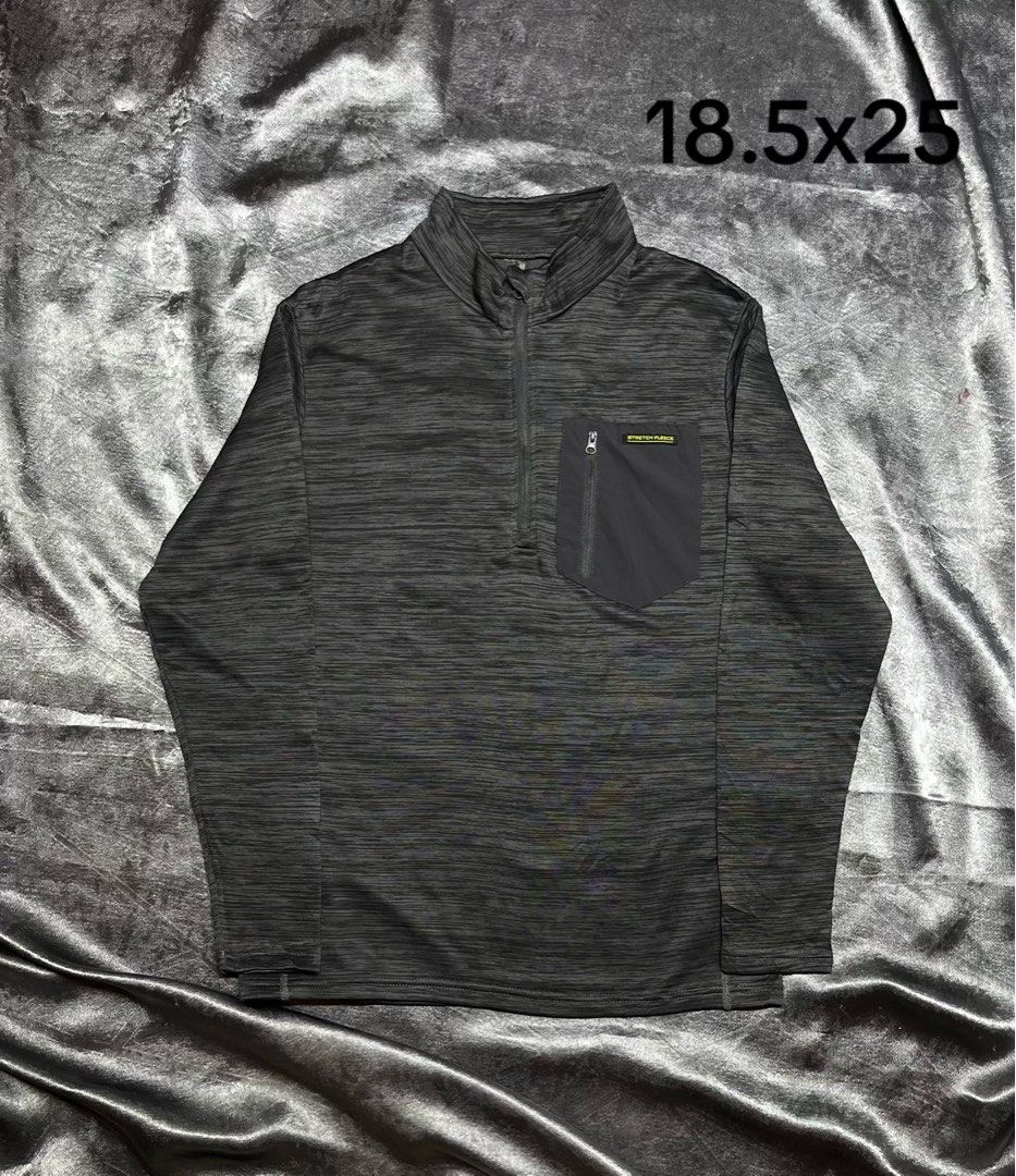 Stretch Fleece Quarter Zip Pullover Charcoal Grey (Category: Coats, Jackets and Outerwear) located in Cavite. Submitted by bellewii (Listing ID 1469528188, Image 1). Description: - Color/Material: Dark grey heathered stretch fleece - Features: Quarter-zip collar, functional zippered chest pocket - Condition: Clean, no pulls or damage found - Size/Fit: Measures 18.5" x 25" flat - Perfect for: Chilly weather layering.