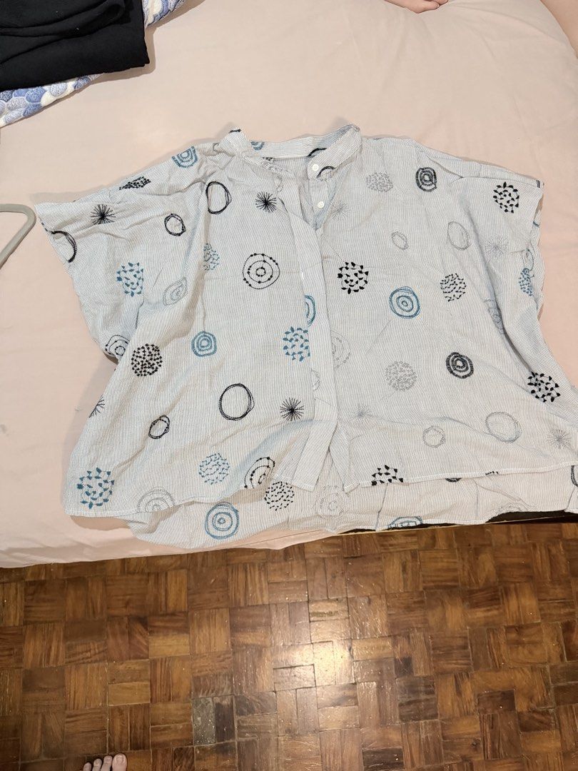 Striped Short Sleeve Blouse with Abstract Pattern (Category: Blouses) located in Paranaque City. Submitted by hannahking36 (Listing ID 1469539394, Image 2). Description: - Color/Pattern: White and blue stripes with fun abstract circles and geometric prints - Style: Short sleeves, collar, and button-up front - Fit: Relaxed and lightweight for ultimate comfort - Versatility: Easy to style with casual jeans or shorts - Mode of Payment: GCash or BPI 