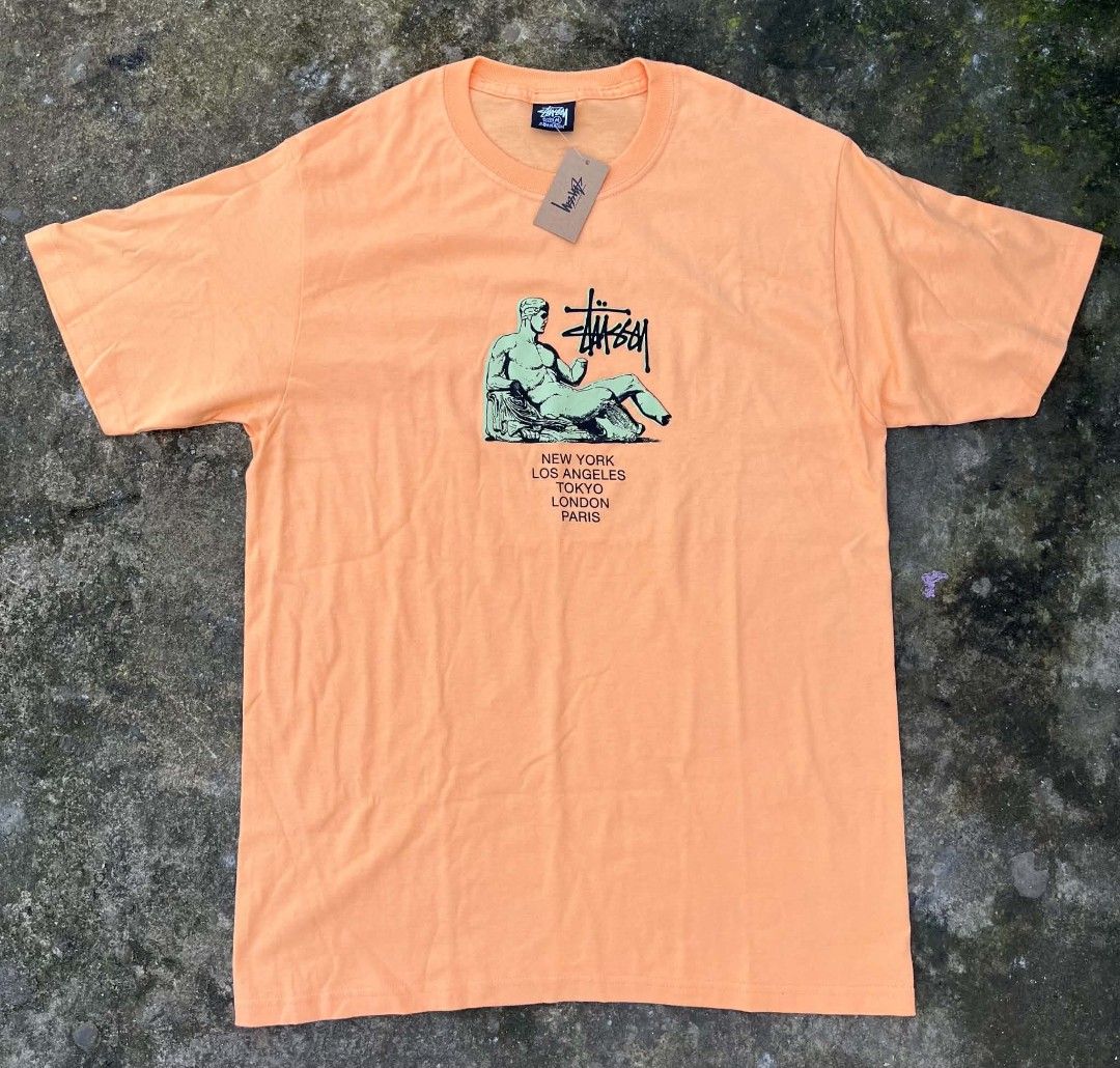 Stussy Dionysos Tee Peach Size M (Category: Tshirts & Polo Shirts ) located in Bacolod City. Submitted by rimboythrift (Listing ID 1469428427, Image 1). Description: - Brand new with original store tags attached - Color: Peach - Classic Stussy Dionysos statue graphic with global cities (New York, Los Angeles, Tokyo, London, Paris) - Material: 100% premium cotton - Fit: Short sleeves, crew neck - Origin: Made in Mexico - Authentic streetwear ready