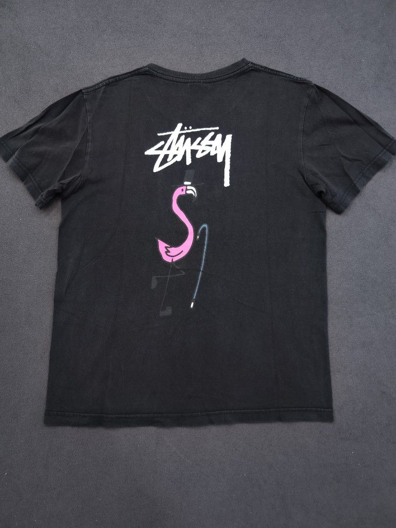 Stussy Flamingo Tee (Category: Tshirts & Polo Shirts ) located in Bulacan. Submitted by emilj23 (Listing ID 1469429617, Image 1). Description: Stussy Flamingo Tee Size M on tag L 26.5 W 20 Condition 8.5/10 Color rate 8.5/10 Issue White Stain.