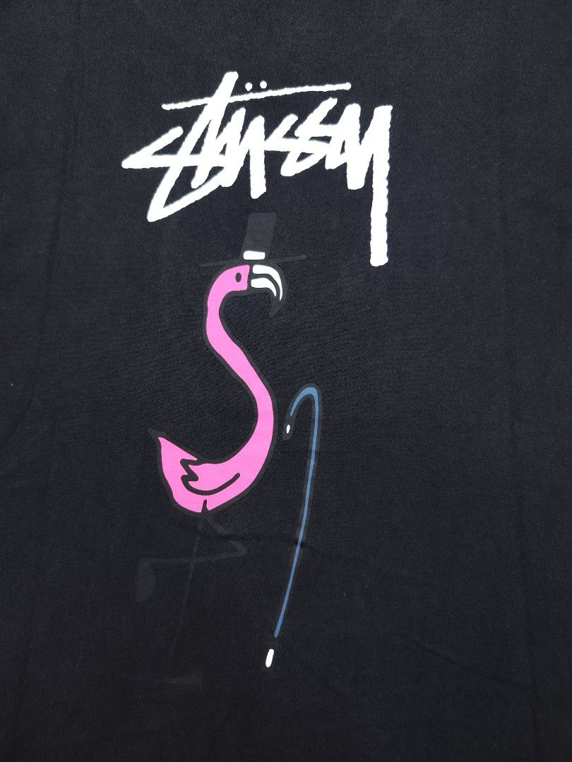 Stussy Flamingo Tee (Category: Tshirts & Polo Shirts ) located in Bulacan. Submitted by emilj23 (Listing ID 1469429617, Image 2). Description: Stussy Flamingo Tee Size M on tag L 26.5 W 20 Condition 8.5/10 Color rate 8.5/10 Issue White Stain.