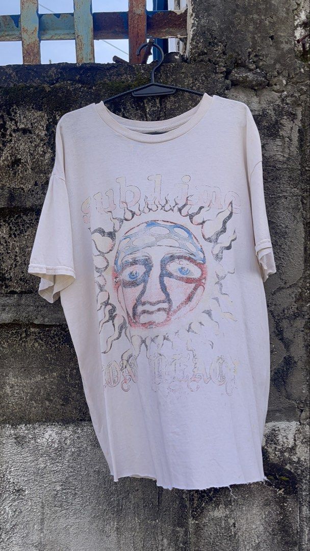 Sublime Sun Face Band T-Shirt Size S (Category: Tshirts & Polo Shirts ) located in Balanga. Submitted by death_vintage (Listing ID 1469476332, Image 1). Description: - Brand: Sublime - Design: Classic sun face graphic - Color: Cream white (faded vintage look) - Size: Small - Material: 100% cotton - Condition: Clean and well-maintained - Features: Short sleeves, crew neck, made in Nicaragua.