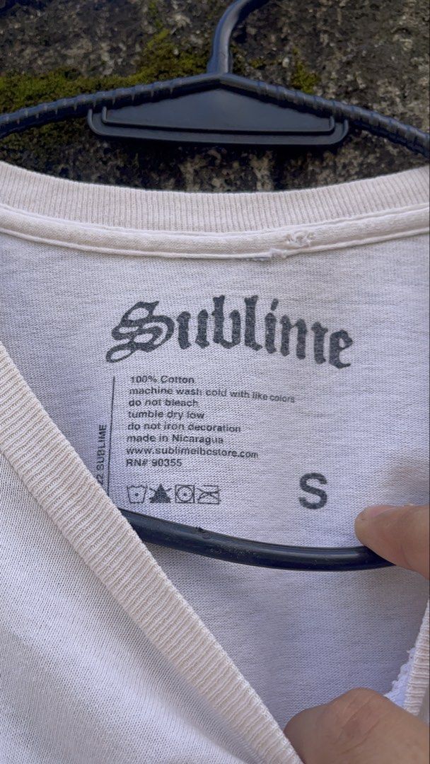 Sublime Sun Face Band T-Shirt Size S (Category: Tshirts & Polo Shirts ) located in Balanga. Submitted by death_vintage (Listing ID 1469476332, Image 3). Description: - Brand: Sublime - Design: Classic sun face graphic - Color: Cream white (faded vintage look) - Size: Small - Material: 100% cotton - Condition: Clean and well-maintained - Features: Short sleeves, crew neck, made in Nicaragua.